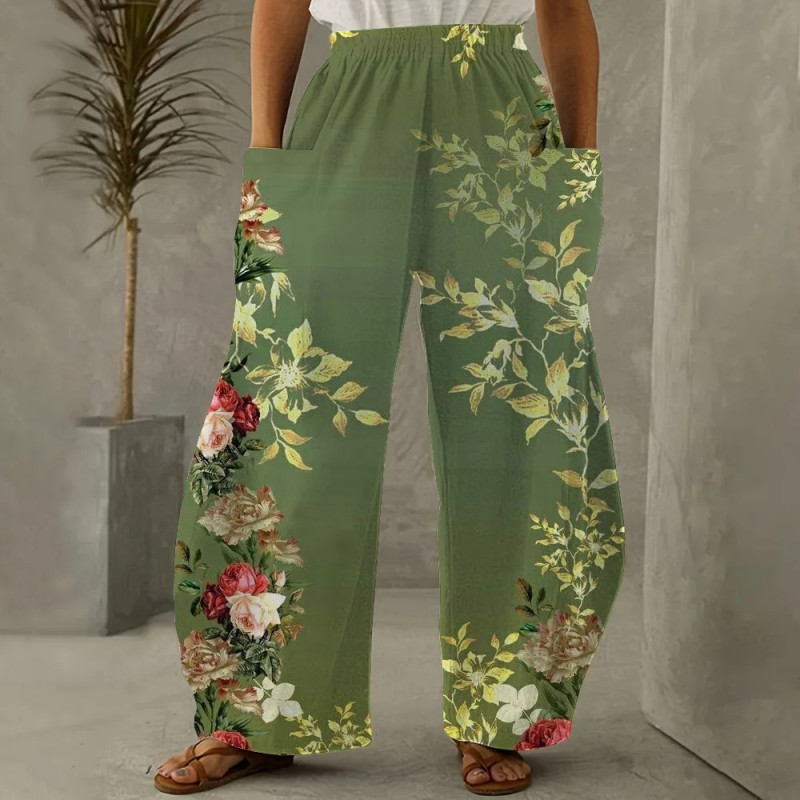 La mode florale a imprimé le pantalon lâche pour l'habillement des femmes Pantalon large de jambe de la poche diagonale des dame